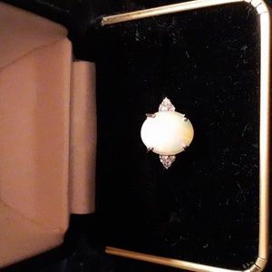 2.36 ct Ethiopian Welo Opal with Diamonds in 10k white gold Appraised at 1620$